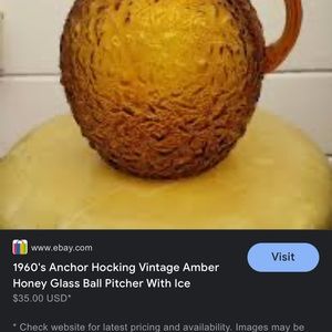 Vintage 1960 AMBER Pitcher , it’s a awesome piece hats hard to find .